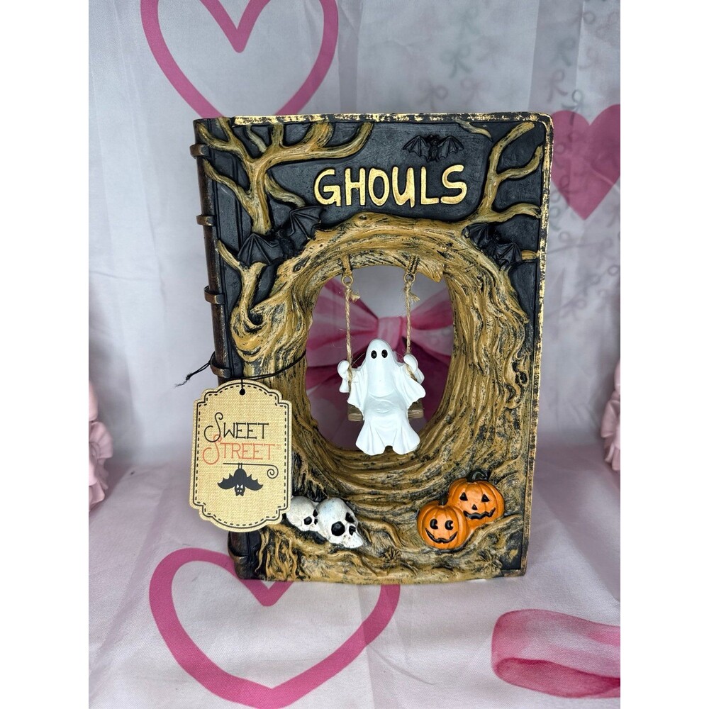 Halloween Ghost Swinging on Tree inside a book